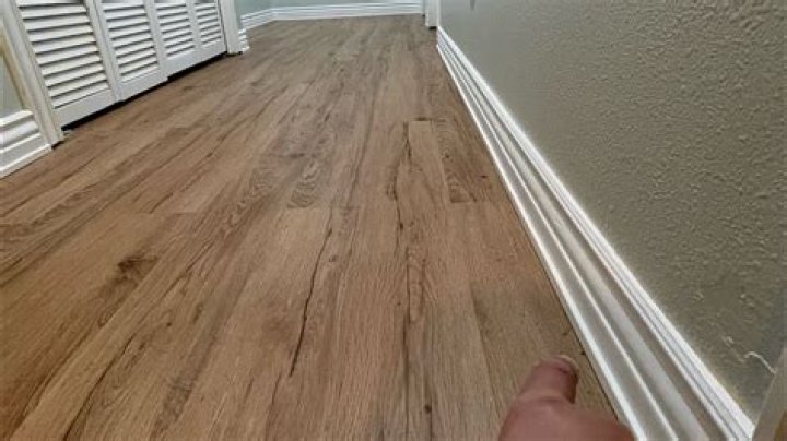 Do you have to take baseboards off to install laminate flooring?
