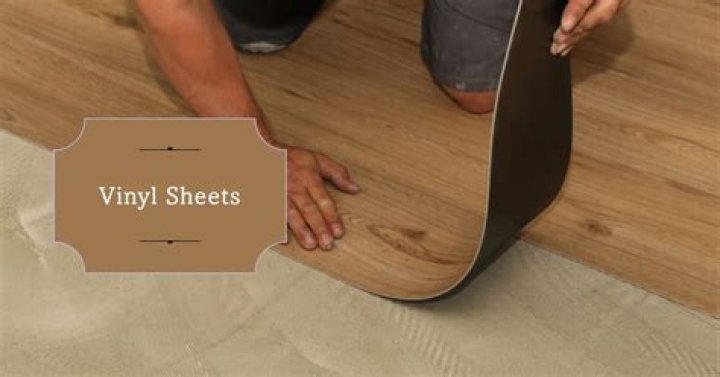 Does vinyl flooring stick to wood?