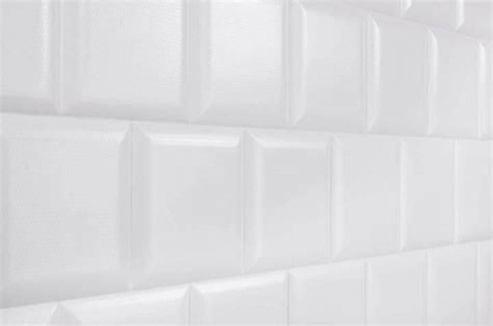 Does white ceramic tile stain?