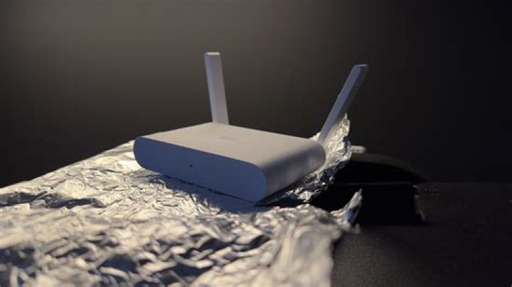 How can I boost my pocket WIFI with aluminum foil?