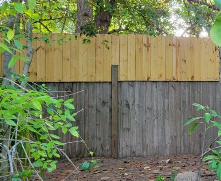 How can I increase the height of my wooden fence?