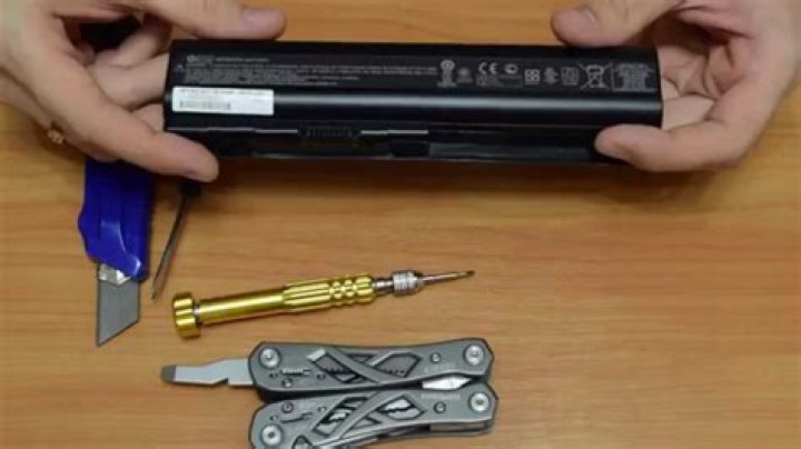How can I open my laptop battery without destroying it?