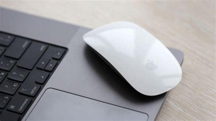 How do I connect my Magic Mouse to my MacBook air?