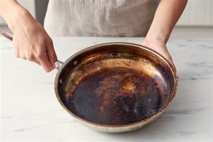 How do you clean a burnt porcelain pan?