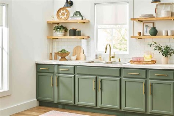 How do you decorate a sage green kitchen?