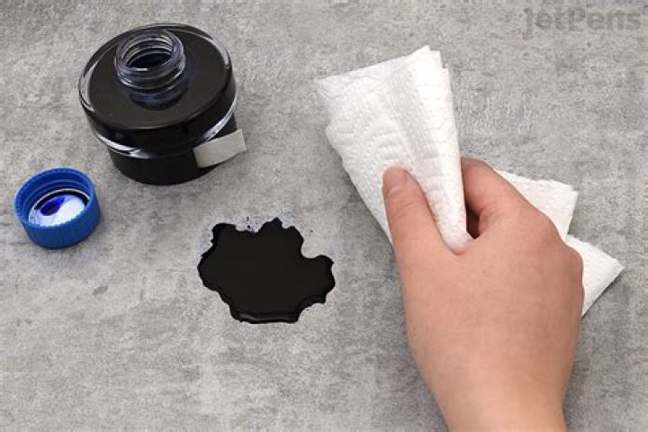 How do you get ink off a hard surface?