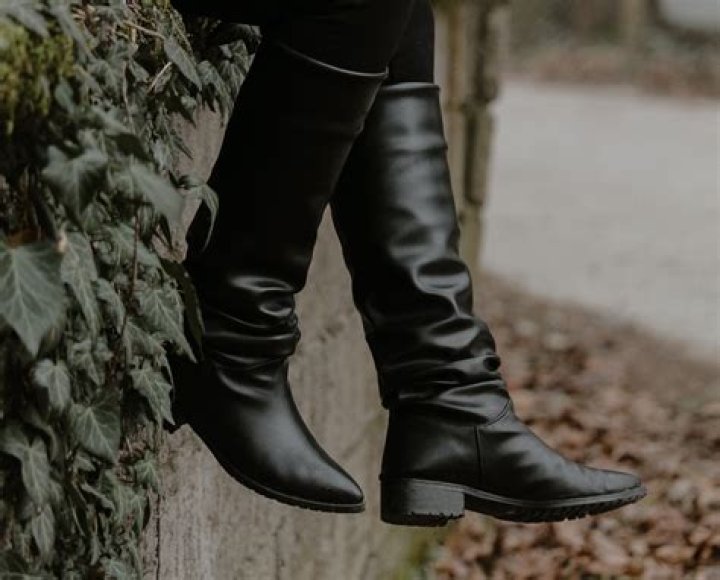 How do you loosen tight leather boots?