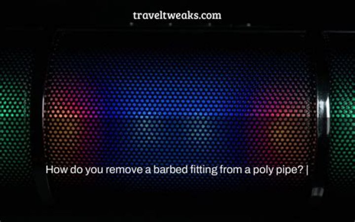 How do you remove a barbed fitting from a poly pipe?