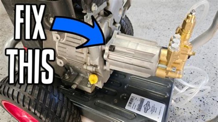 How do you remove a water pump from a pressure washer?