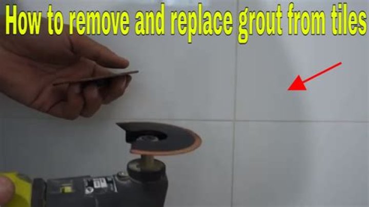How do you remove excess grout?