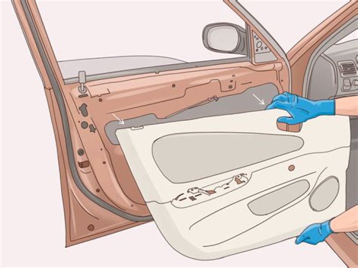 How do you remove the door panel on a 2002 Nissan Altima?