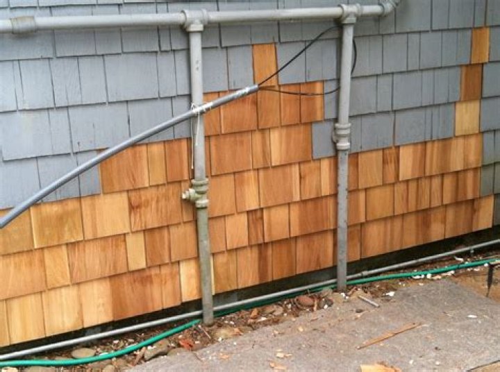 How do you remove wood shingle siding?