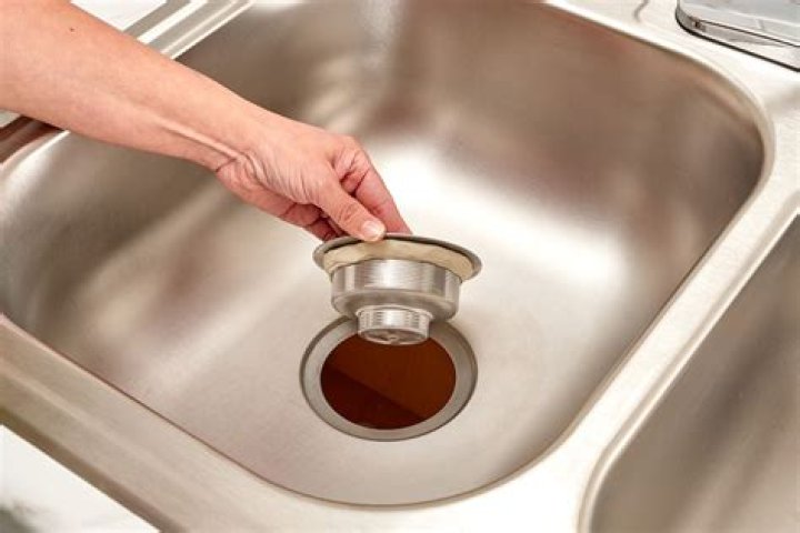 How do you replace a kitchen sink seal?