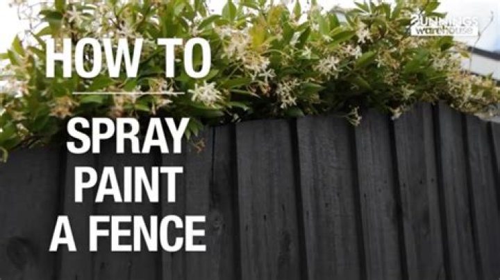 How do you spray paint a fence?