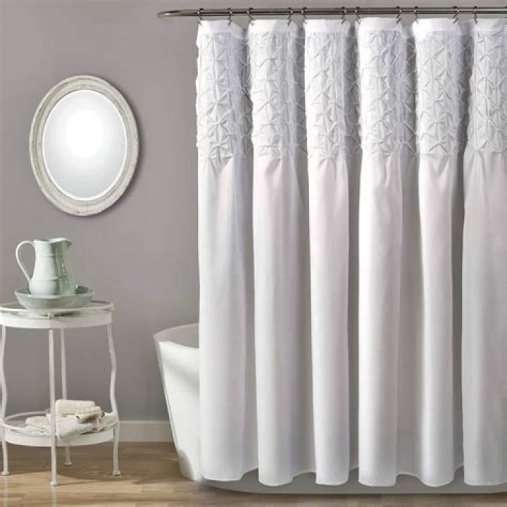 How many yards of fabric do you need to make a shower curtain?