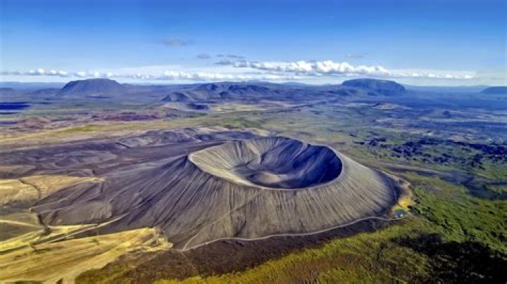 What are shield volcanoes?