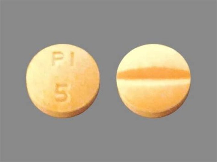 What kind of pill is round and orange?