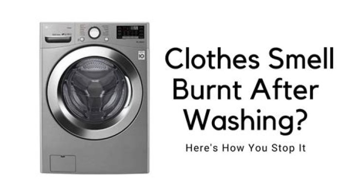 Why do my clothes smell burnt when they come out of the dryer?