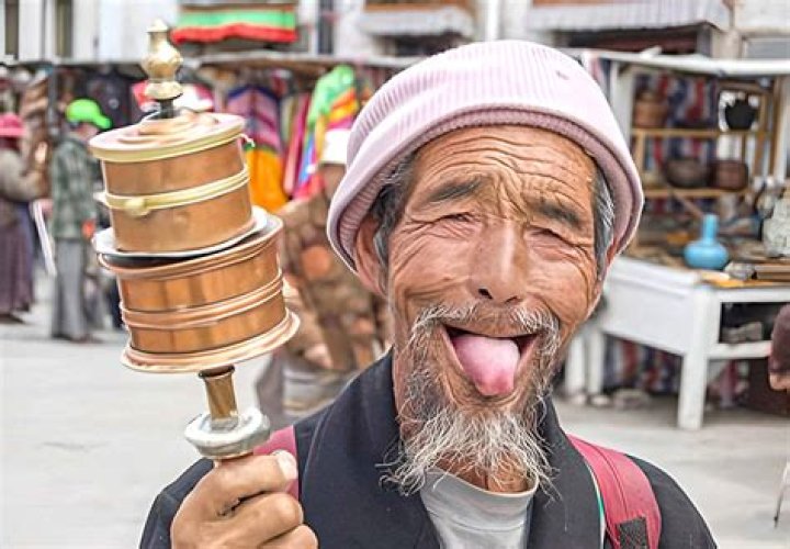 Why do Tibetans stick out tongue?