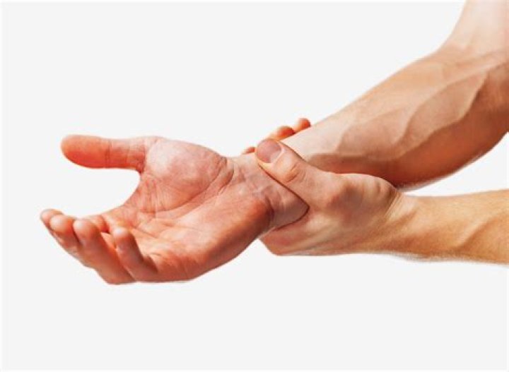 Why does my wrist hurt when lifting?